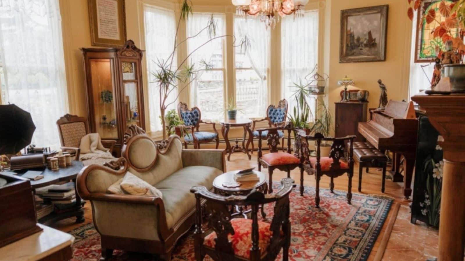 Adams Pragge common area with sofa and antique chairs